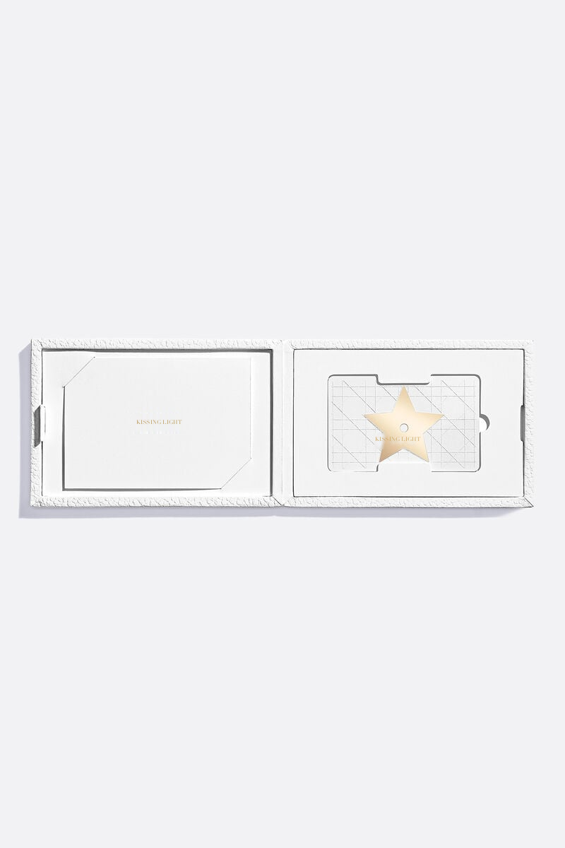 Kissing Light gift card in its presentation case